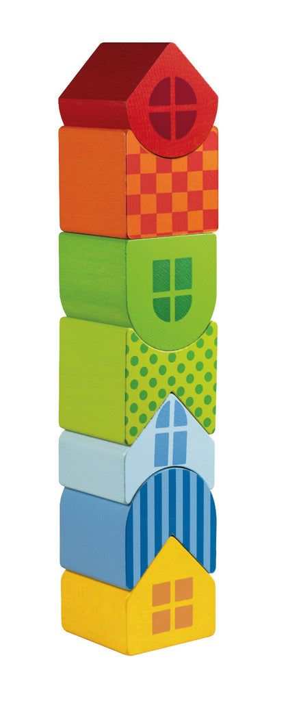 Colorful wooden stacking tower with 7 pieces, promoting motor skills for children aged 1 and up.