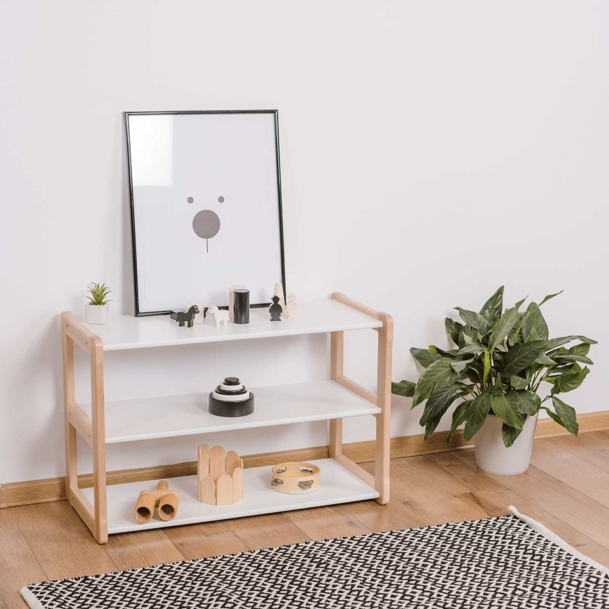 Montessori-style Regal Mini shelf in natural wood, ideal for children&#39;s toy and book storage.