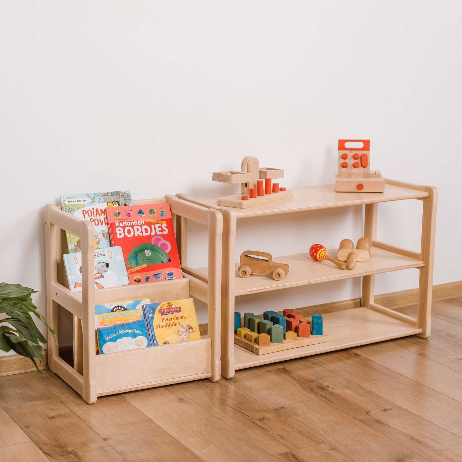 Montessori-inspired mini bookshelf and shelf set in wooden finish for children's room.