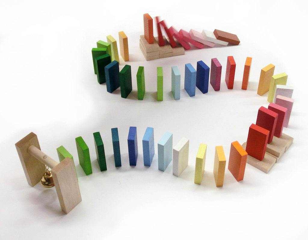 Colorful wooden domino track with bell for children, enhancing creativity and motor skills. Suitable for ages 3 and above.