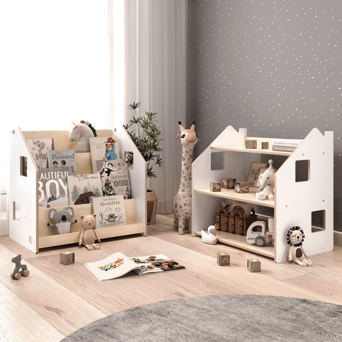 White Montessori-style bookshelf and toy shelf in a children&#39;s room, featuring accessible and organized storage.