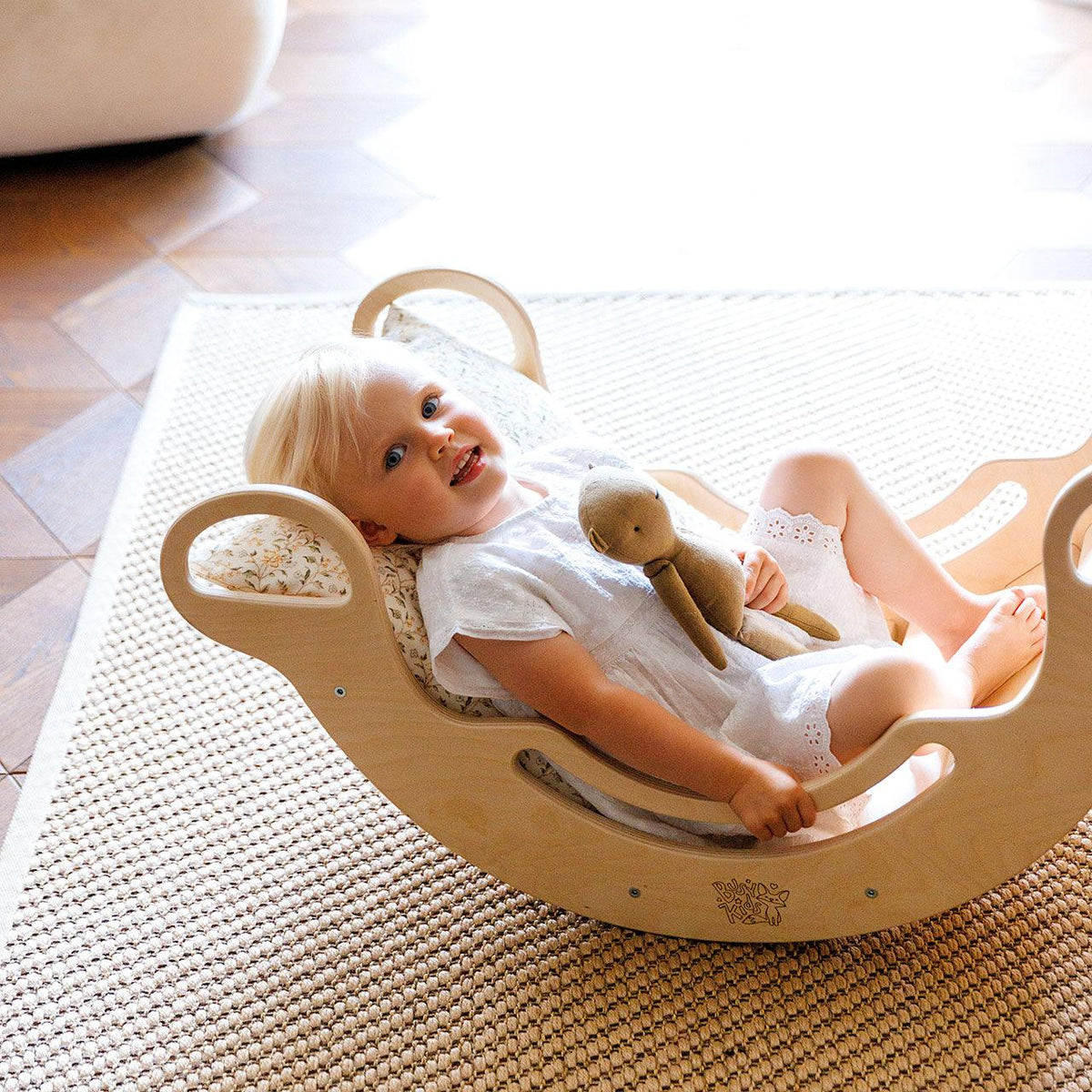 Wooden rocker swing for toddlers, versatile indoor play equipment, durable birch plywood.