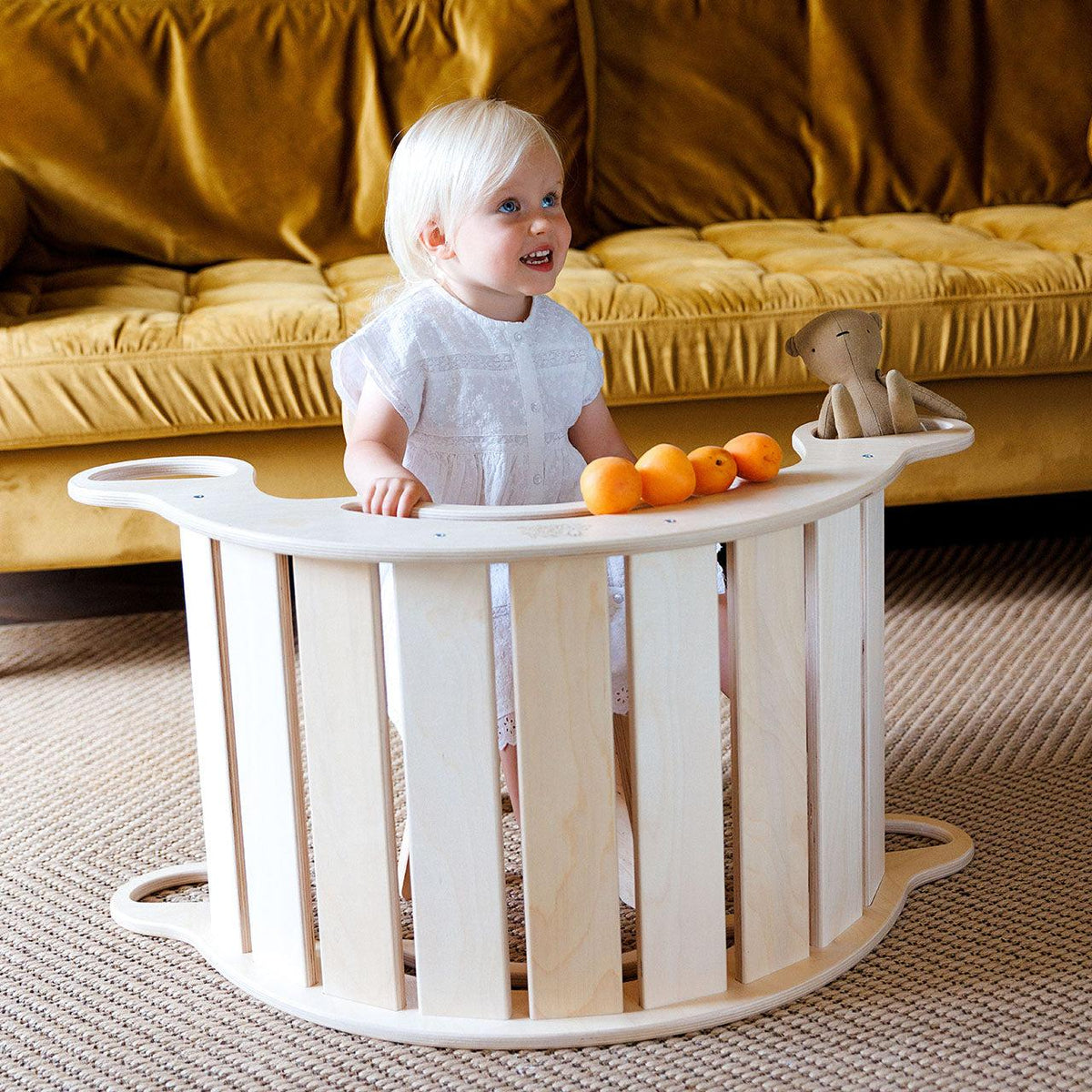 Multifunctional wooden rocker for kids, promoting movement and creativity.