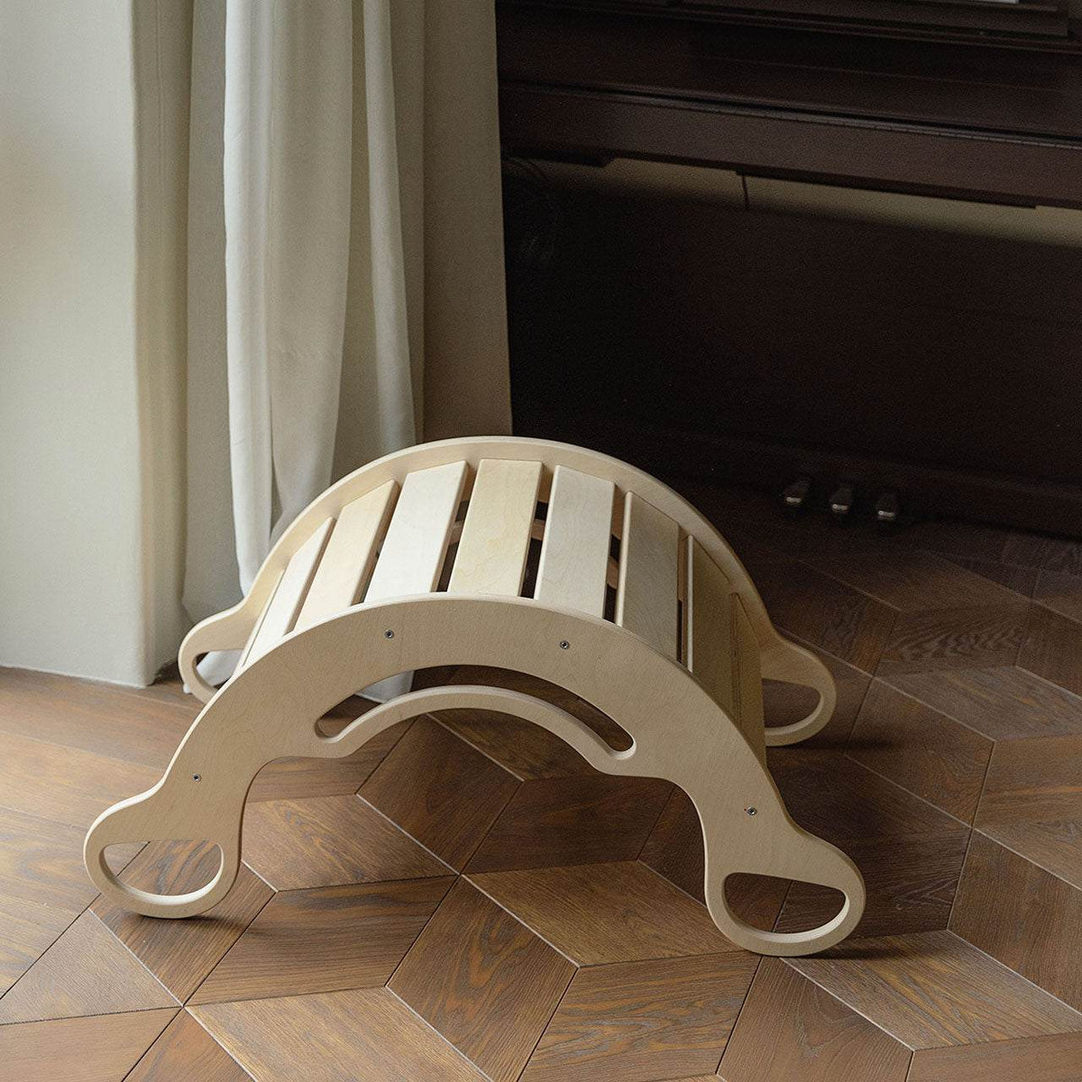 Multifunctional wooden rocker for kids, durable birch plywood design.