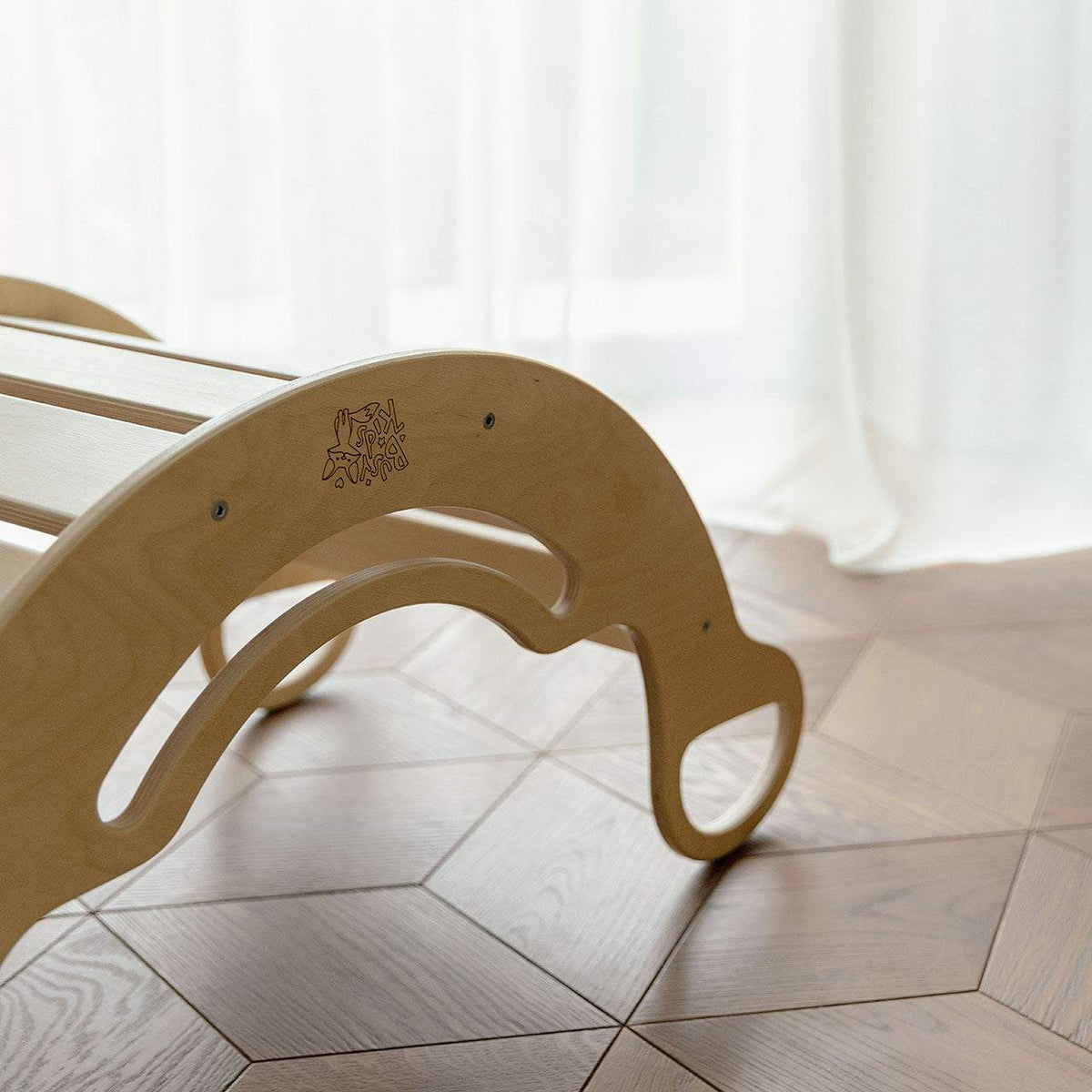 Wooden balance rocker for kids, multifunctional seesaw, natural finish.