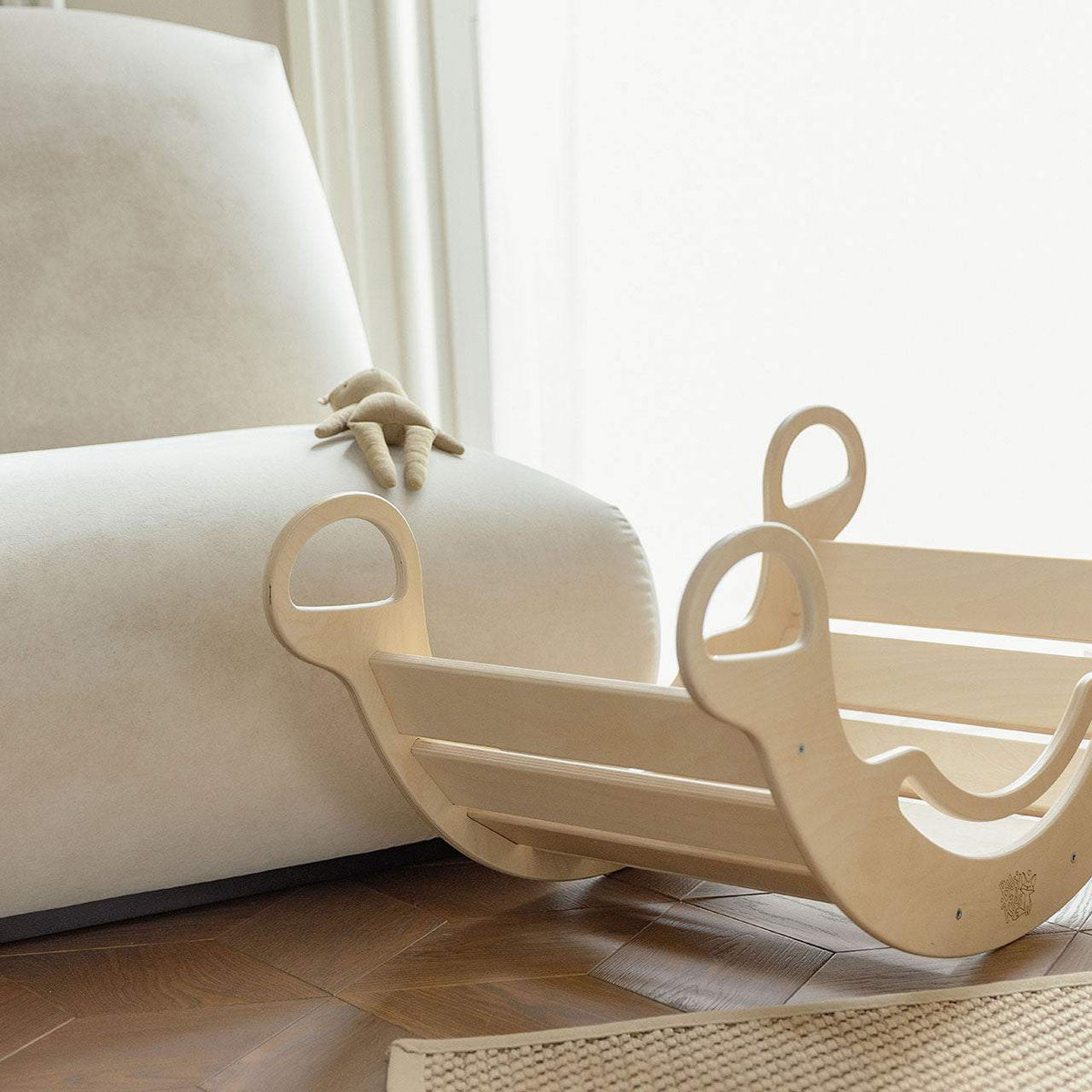 Montessori 5-in-1 wooden rocker with double-sided board, promoting motor skills, natural wood finish.