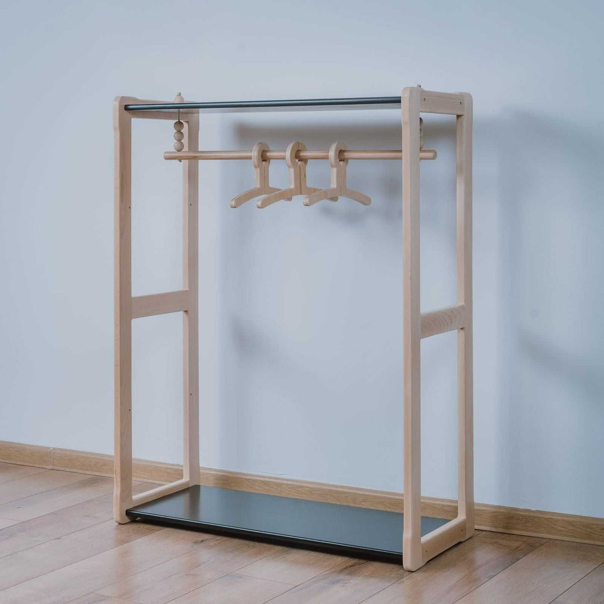 Montessori inspired open wardrobe with Maxi-shelf for children, made from FSC-certified wood.