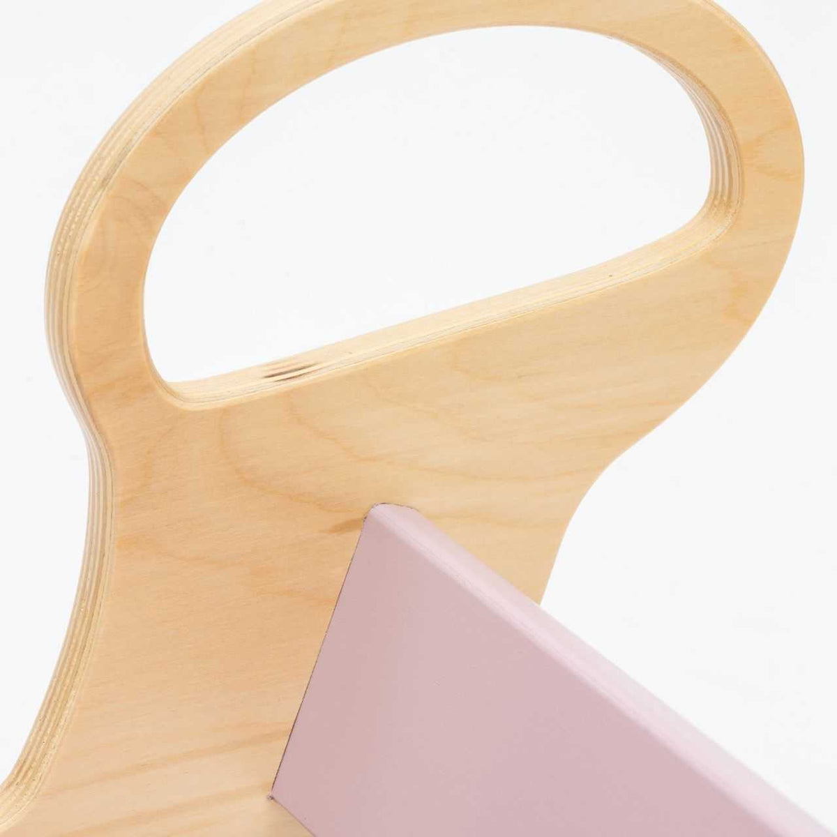 Set of pastel-colored rocking chair, dual-sided board, and mini chair for children.