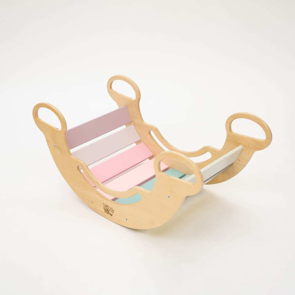 Set of pastel-colored rocking chair, double-sided board, and mini chair for children.