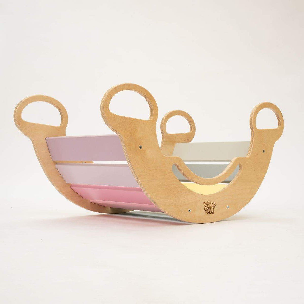 Montessori 5-in-1 wooden balance rocker with pastel colors, promotes fine and gross motor skills development for children.