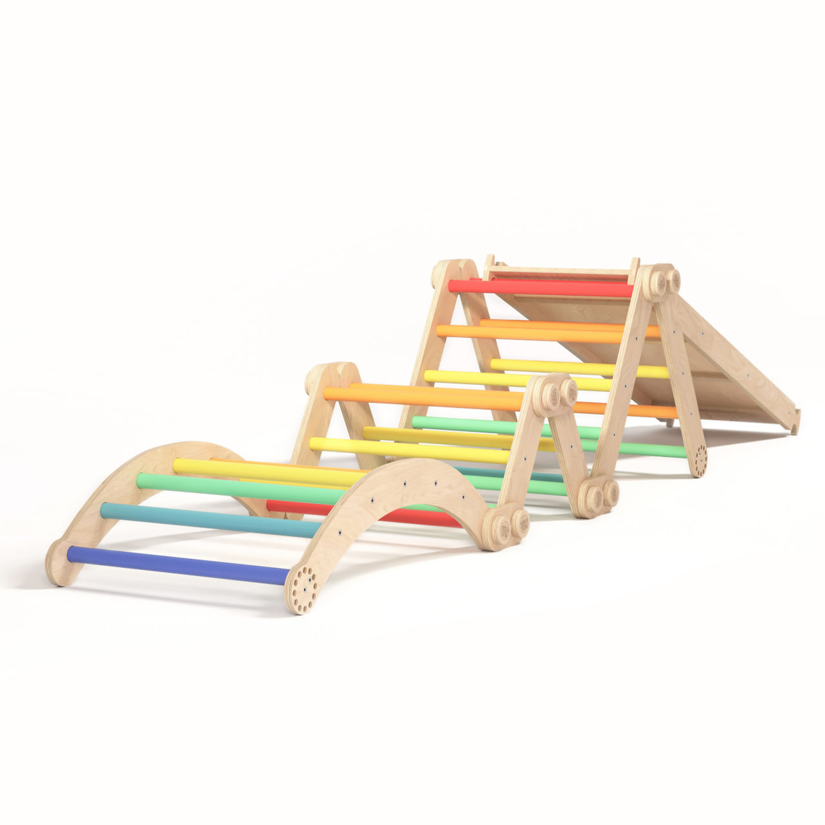Rainbow-colored children&#39;s climbing set with slide, including two Pikler triangles and swing, made of birch wood.