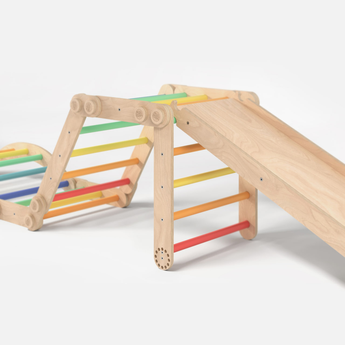 Maxi climbing frame for kids with slide in rainbow colors, featuring wooden construction and versatile design.