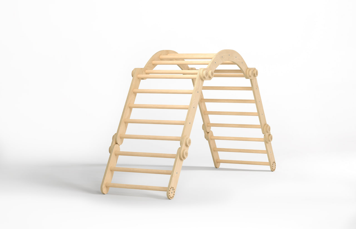 Children&#39;s natural wooden climbing set with swing.