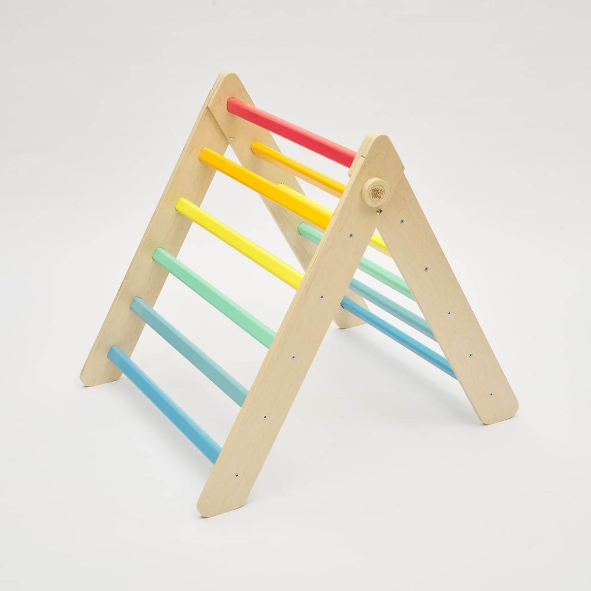 Colorful wooden climbing triangle for kids, enhancing motor skills and creativity, suitable from 1 year.
