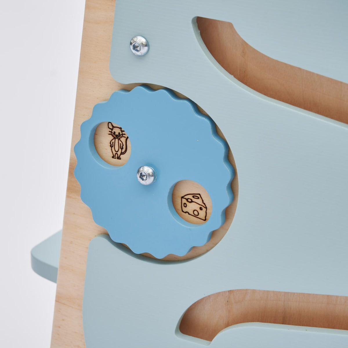 Detail of Lernturm multi-purpose learning tower with mint green side elements and interactive gears.