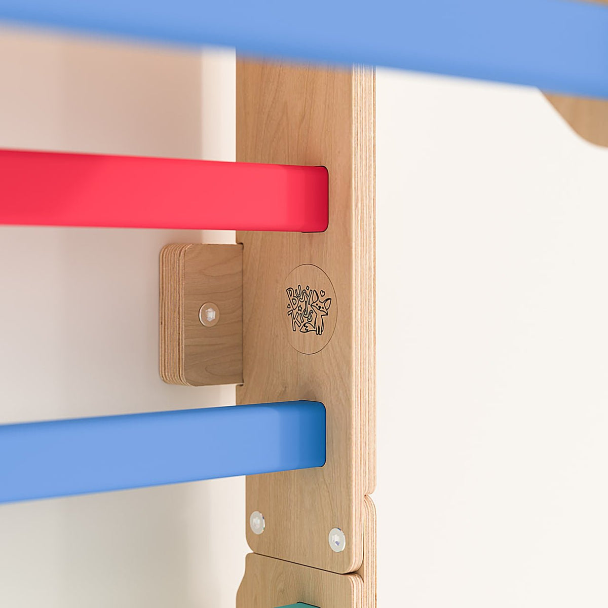 Children&#39;s play wall bars made of birch plywood, colorful wooden rungs.